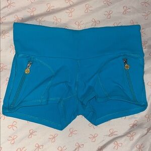 Women's Bright Blue TNA Athletic Shorts with Zip Pockets